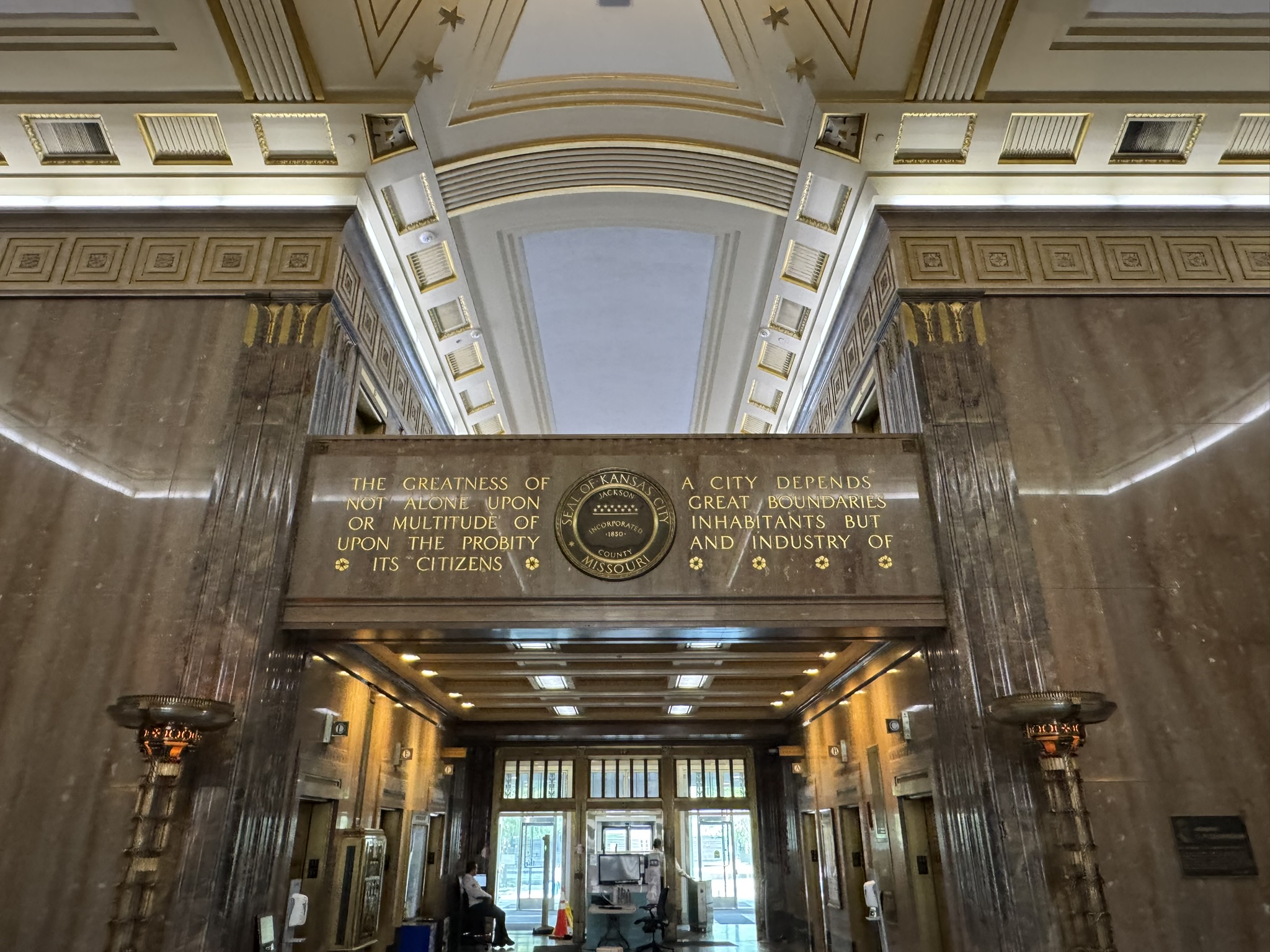 Interior of Kansas City, MO City Hall. The greatness of a city depends not alone upon great boundaries or a multitude of inhabitants but upon the probity and industry of its citizens